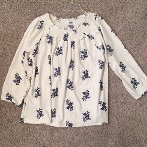 A cream and flowered old navy blouse for girls